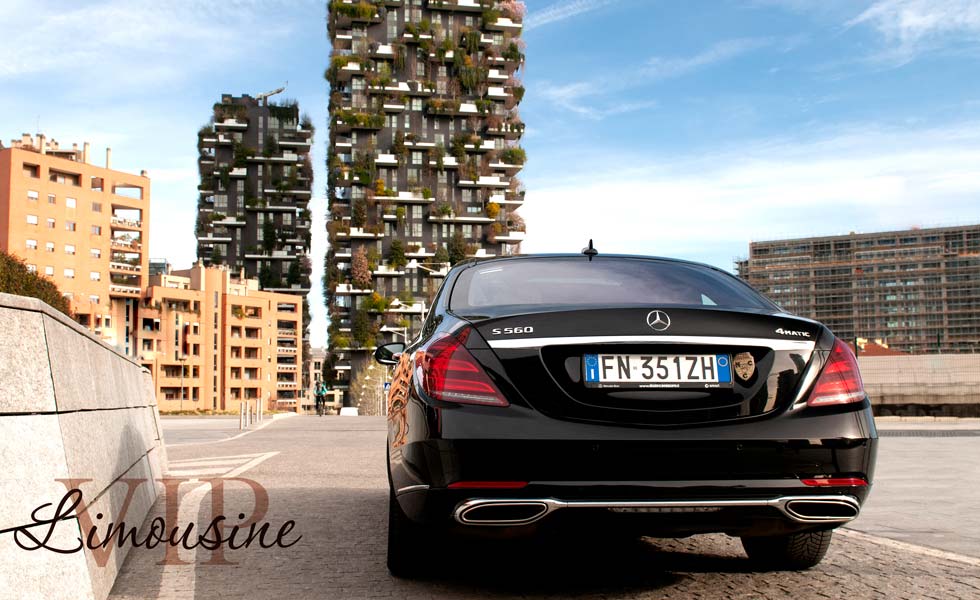 Mercedes S Class 560 with driver: rear view