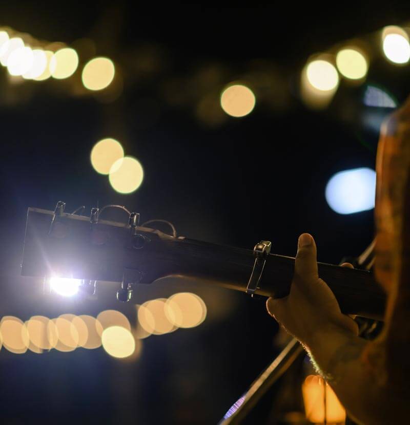 Living Milan: lights atmosphere and close up guitar