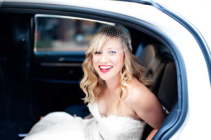 Wedding in a luxury chauffeuered car